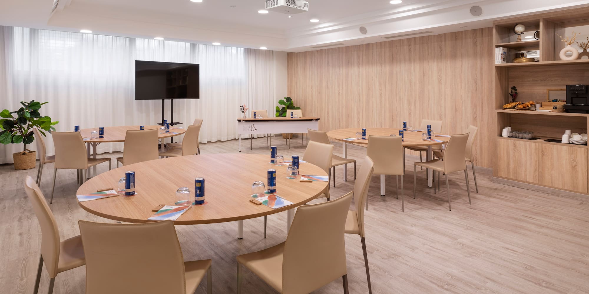 a room with tables and chairs