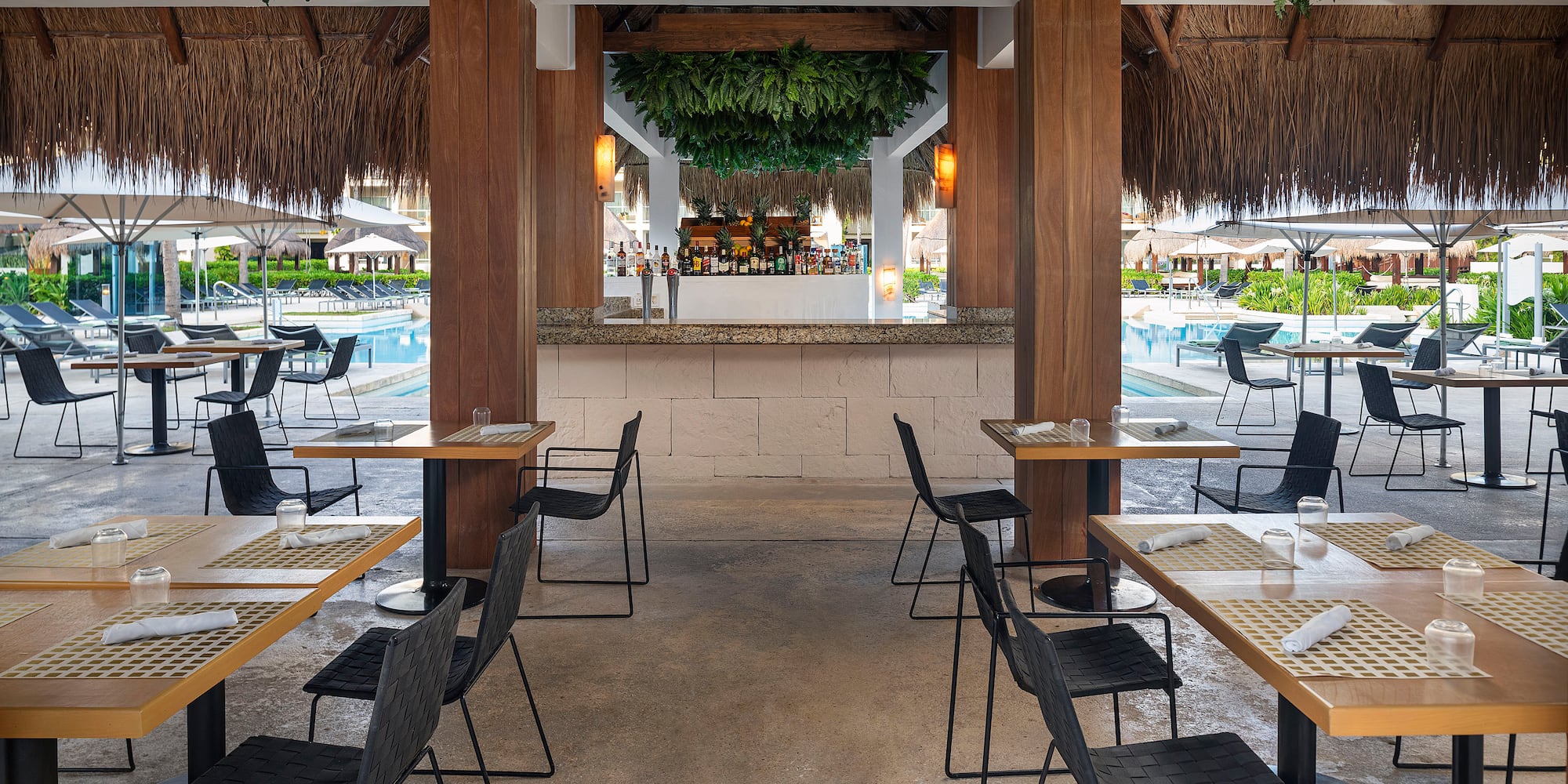 a restaurant with tables and chairs