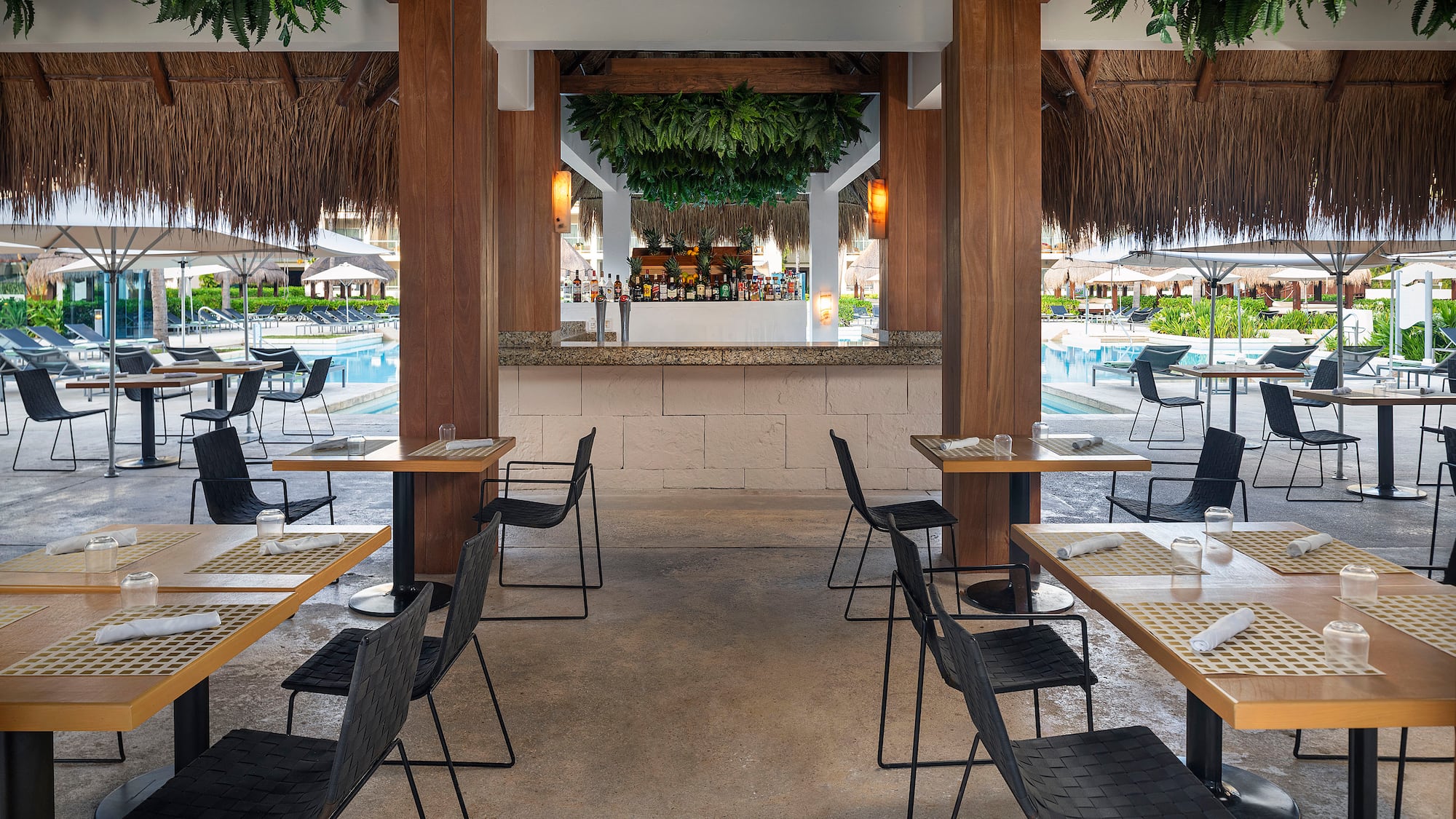 a restaurant with tables and chairs