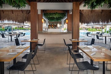 a restaurant with tables and chairs