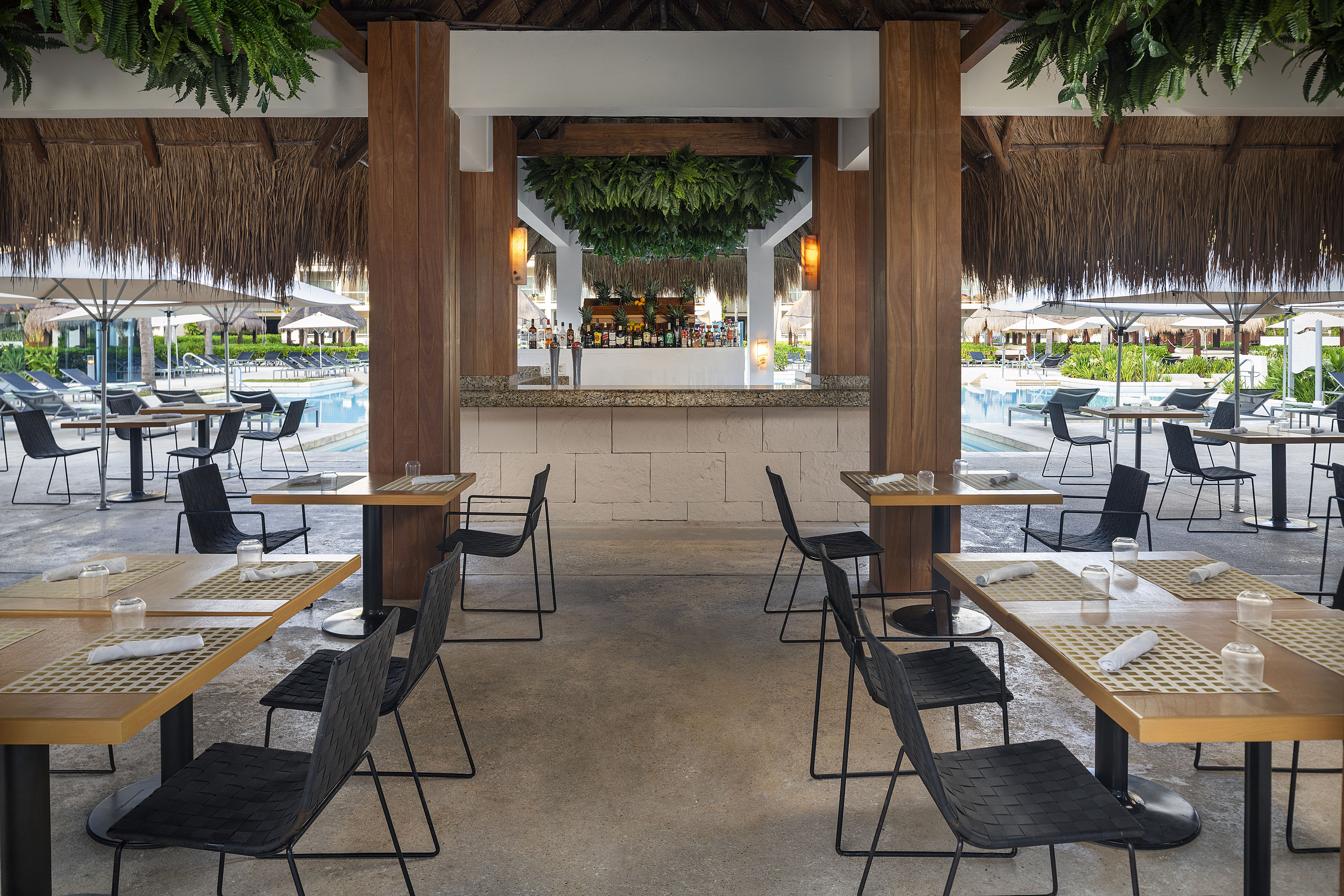 a restaurant with tables and chairs