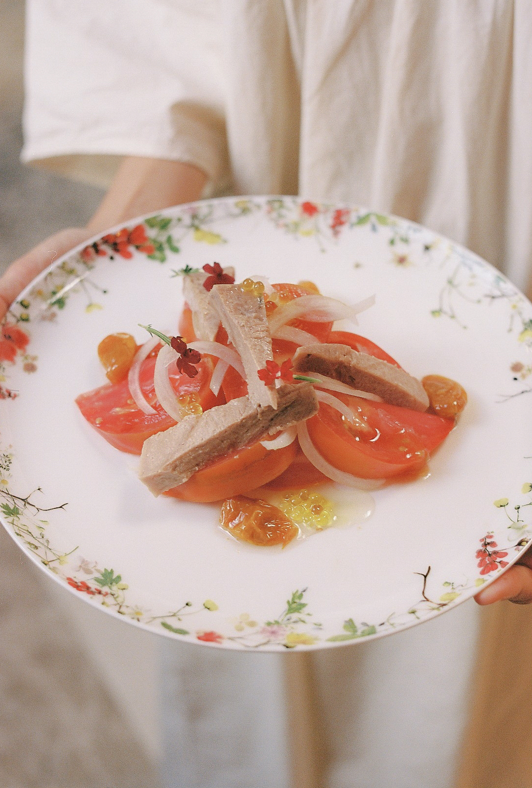 a plate of food with meat and onions