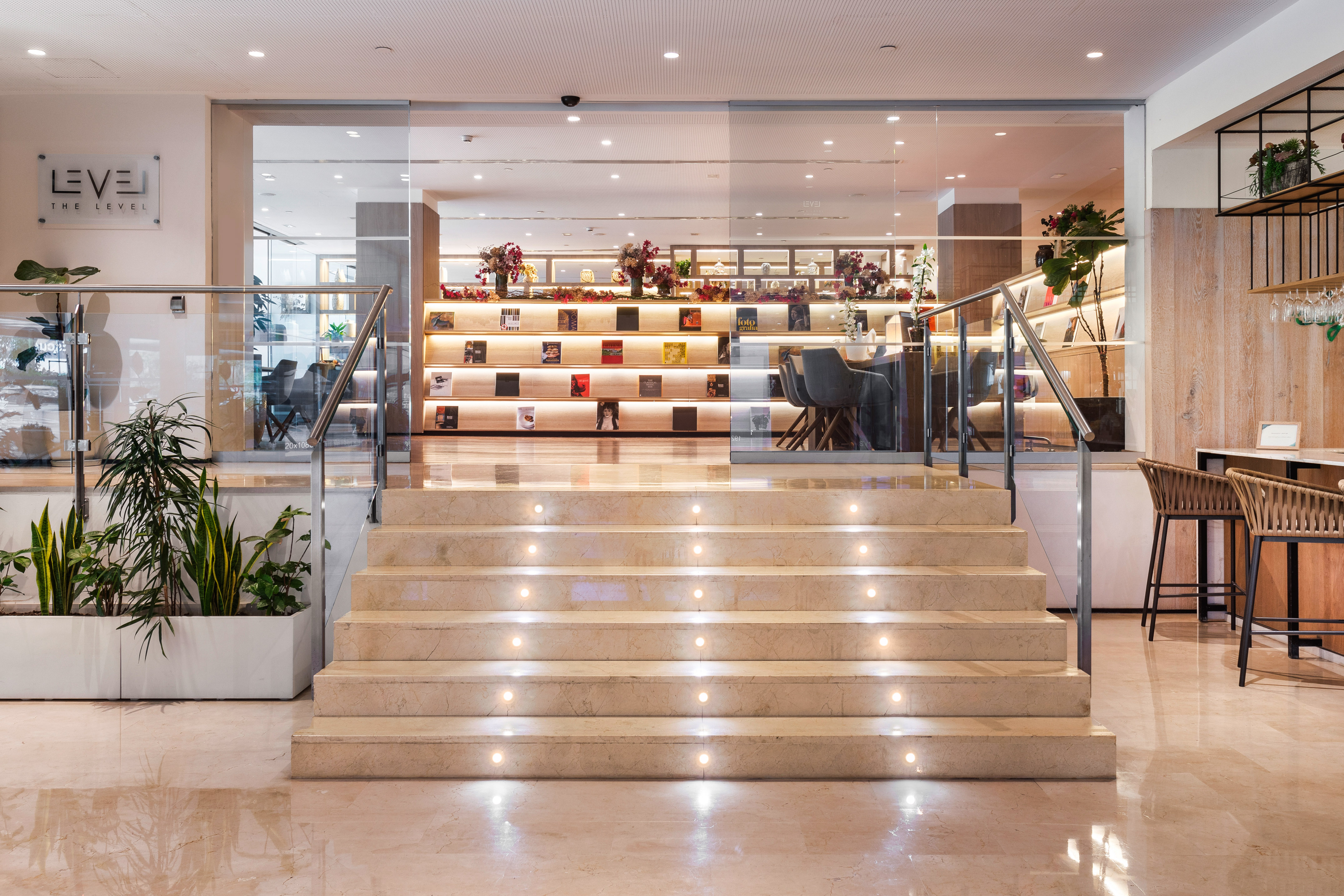 Let yourself be carried away by a world of distinction and exclusive amenities a staircase in a building