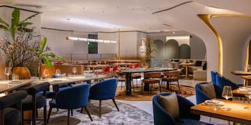 a room with tables and chairs