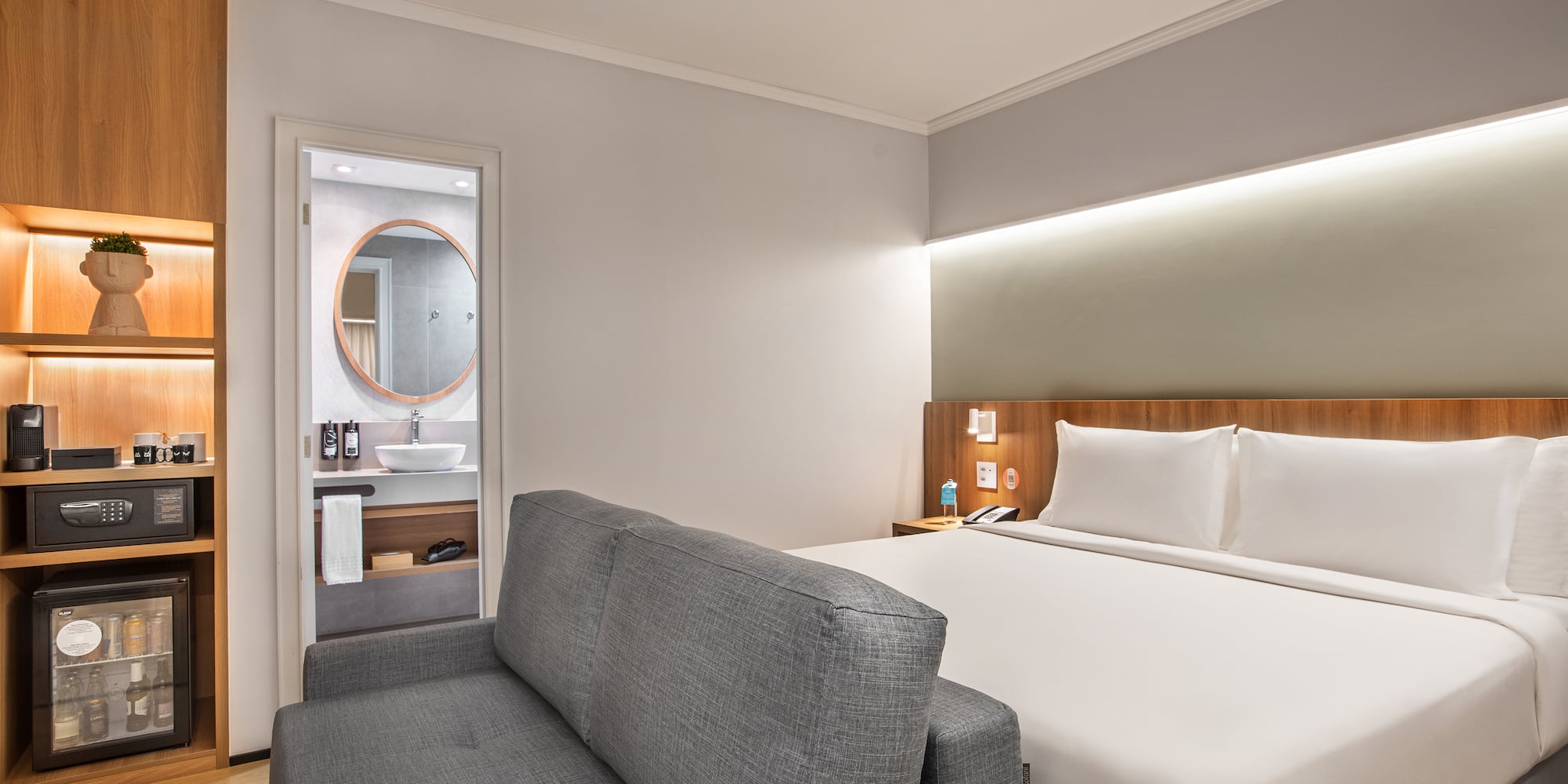 a room with a bed and a couch