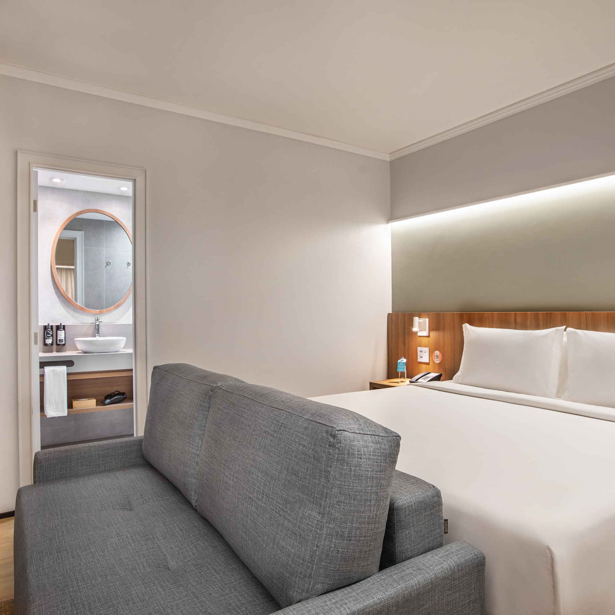 a room with a bed and a couch