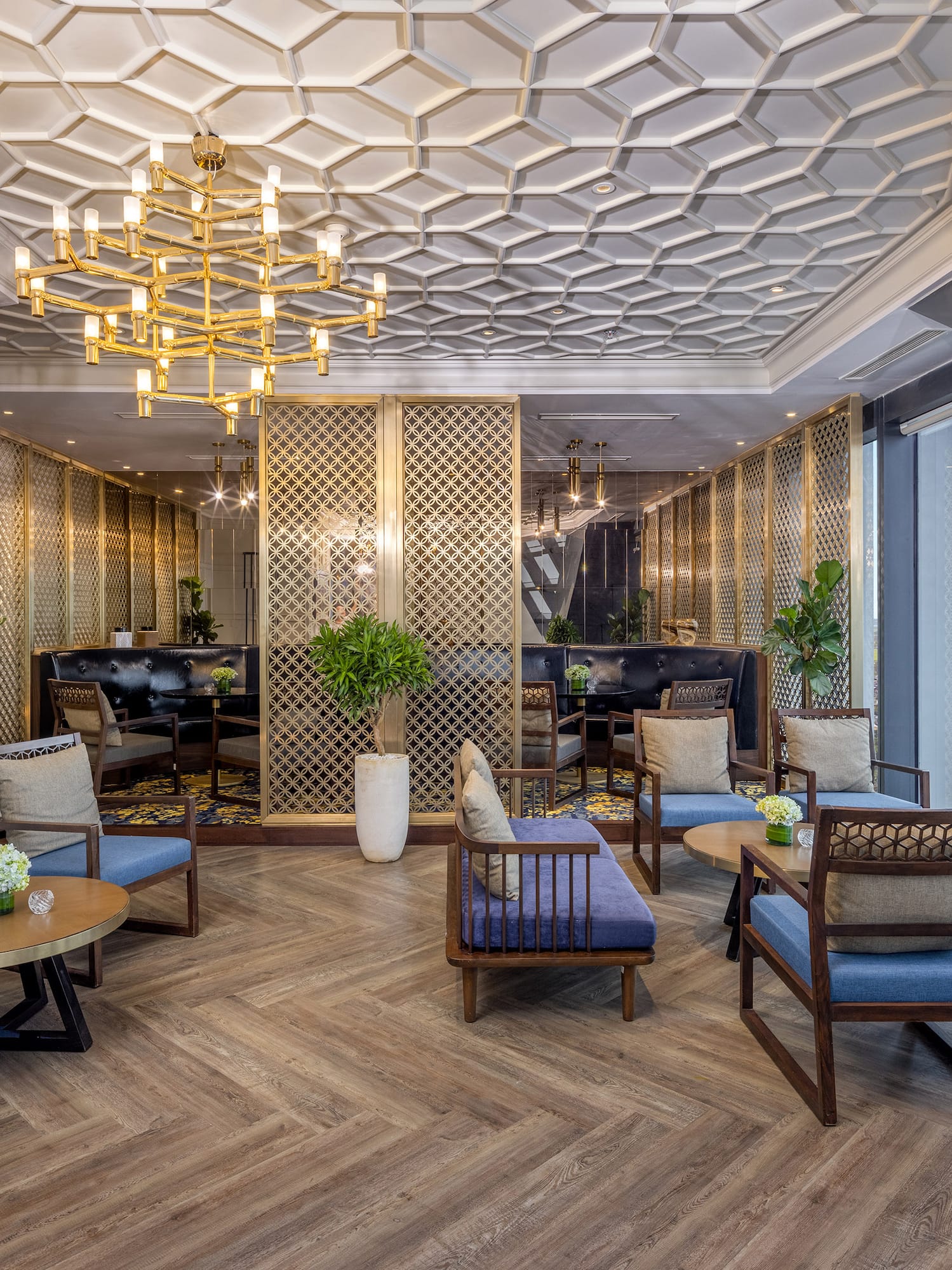 a room with a chandelier and chairs