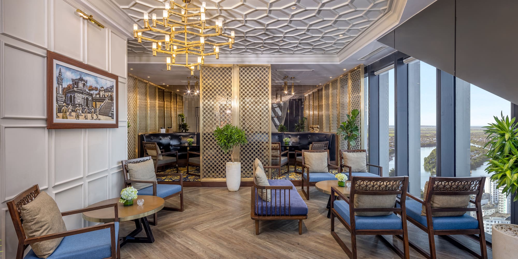 a room with a chandelier and chairs