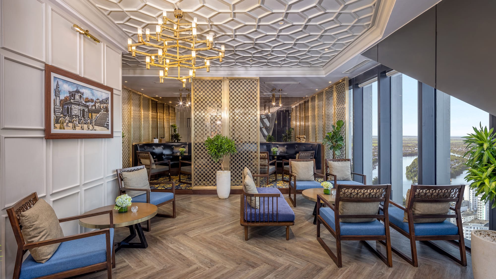 a room with a chandelier and chairs