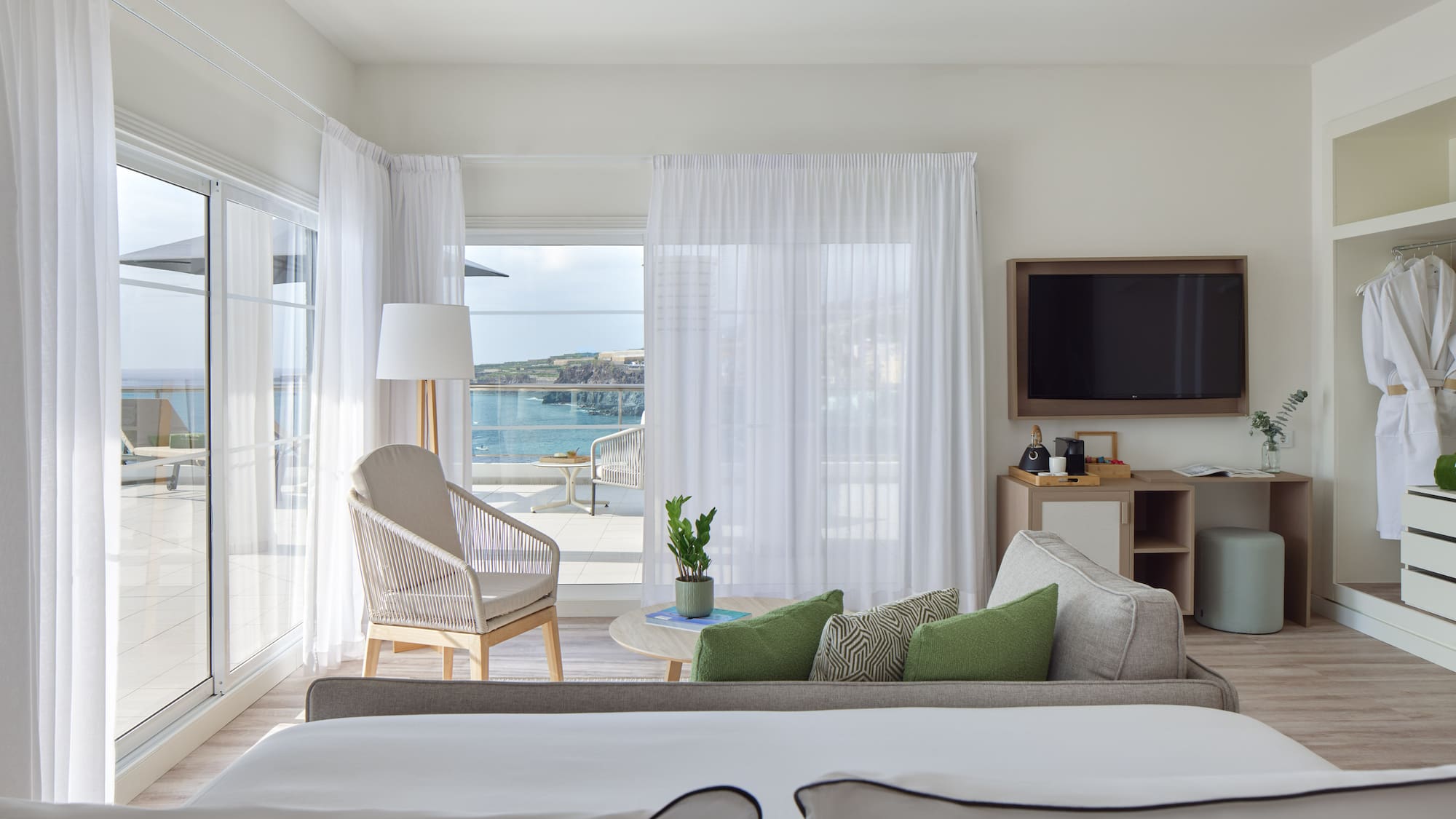 a room with a television and a couch