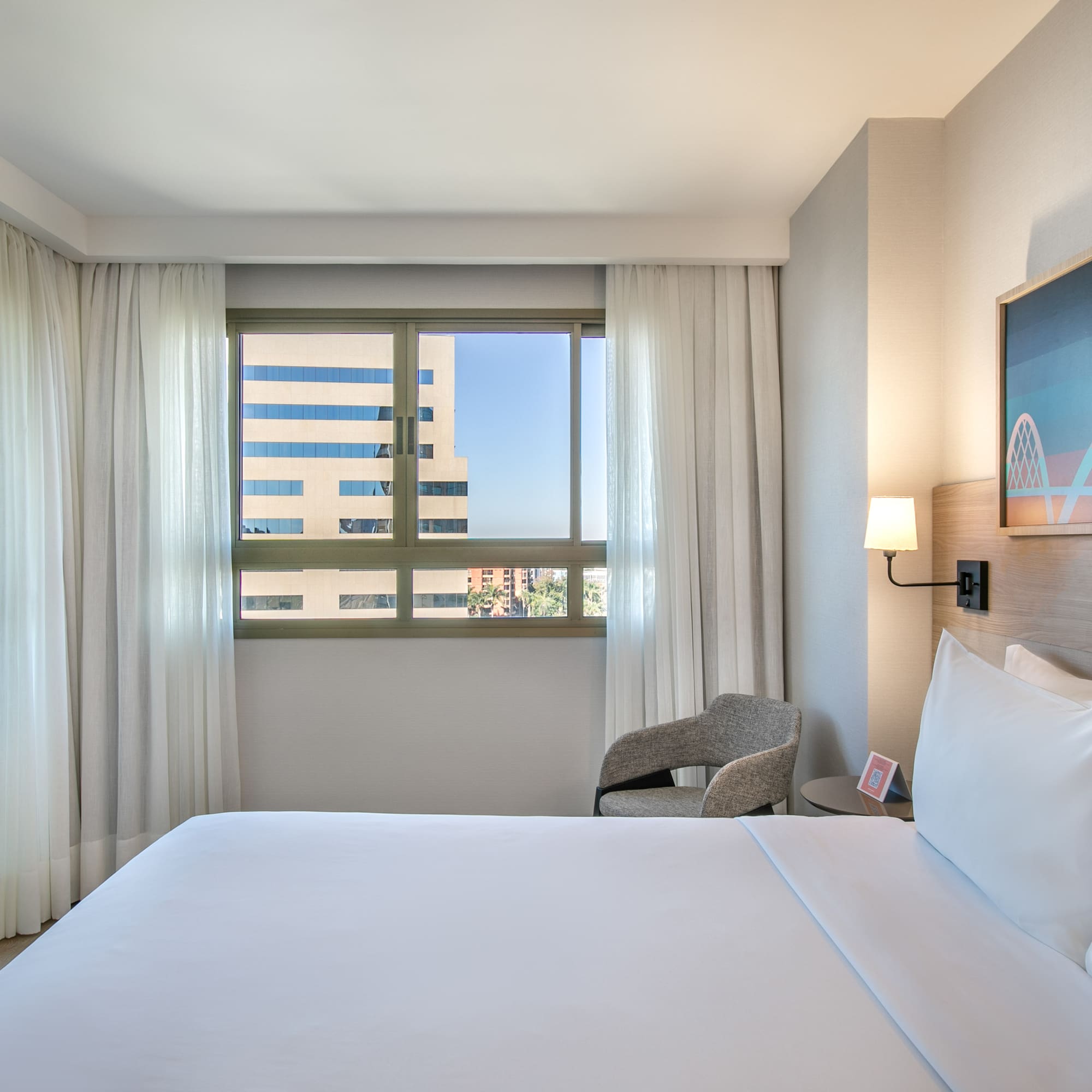 a bed in a hotel room