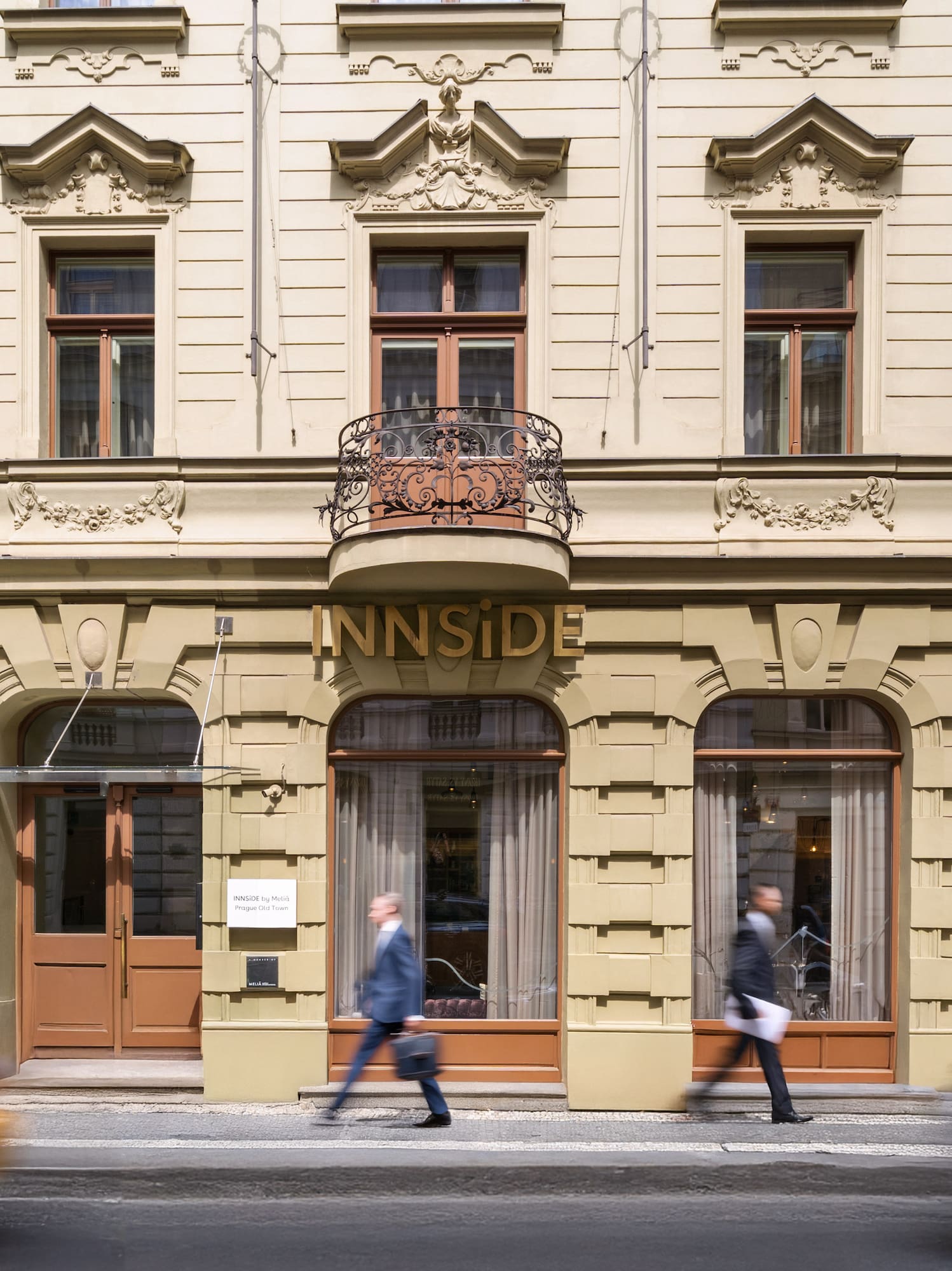 a group of people walking on the street