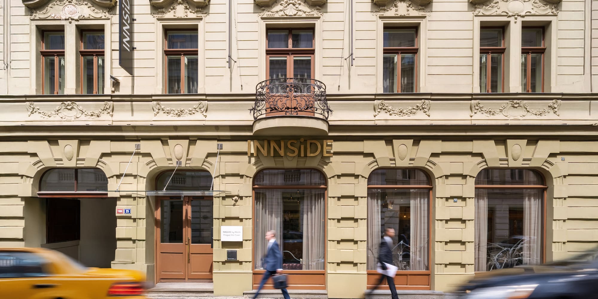a group of people walking on the street