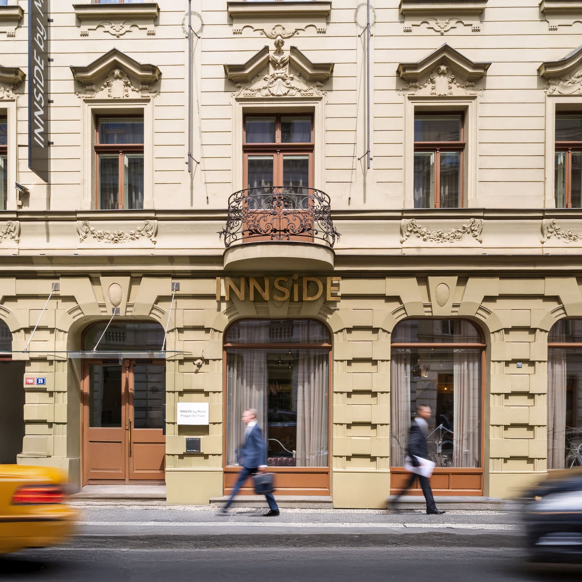 a group of people walking on the street