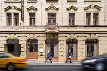 a group of people walking on the street