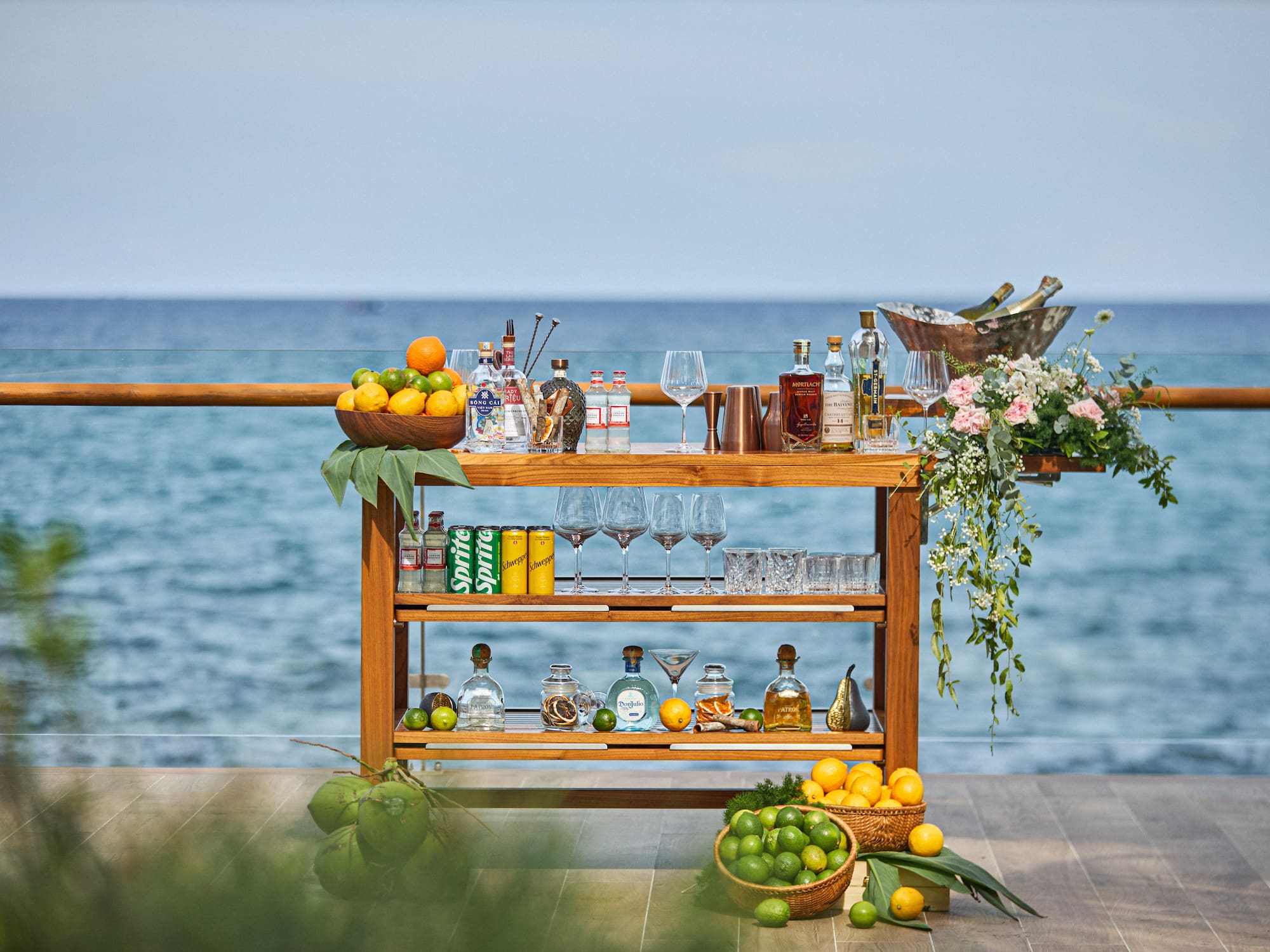 a bar with bottles and glasses on it
