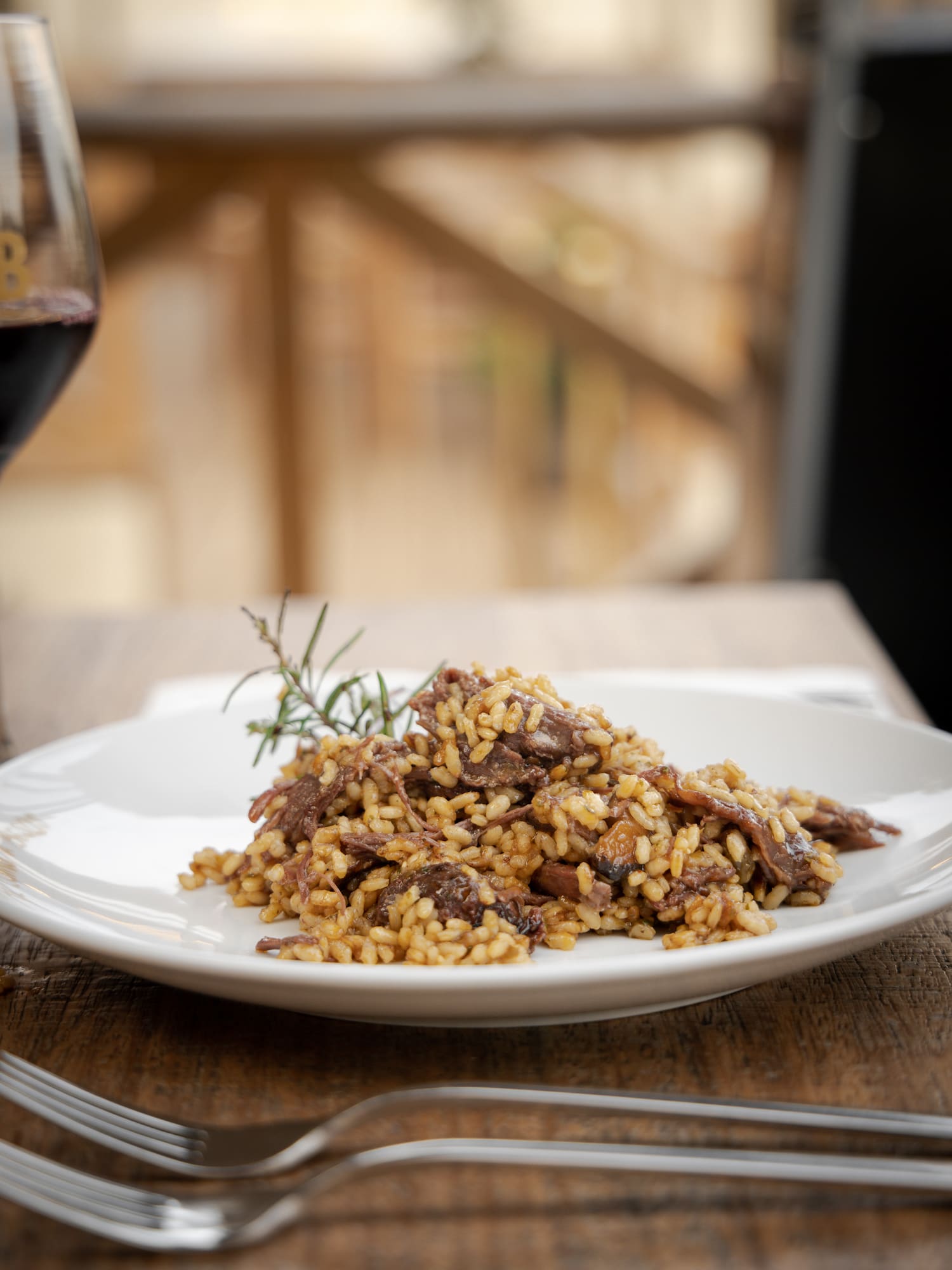 a plate of rice and meat on a table