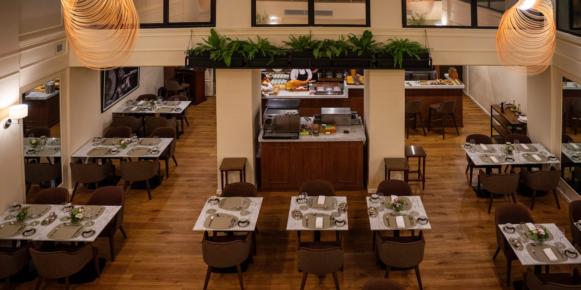 a restaurant with tables and chairs