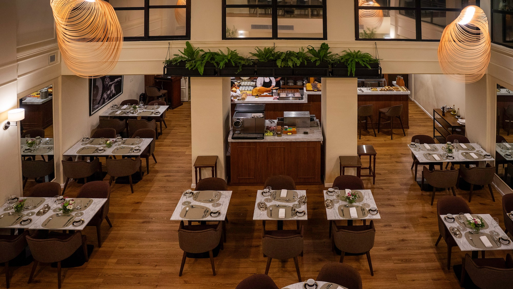 a restaurant with tables and chairs