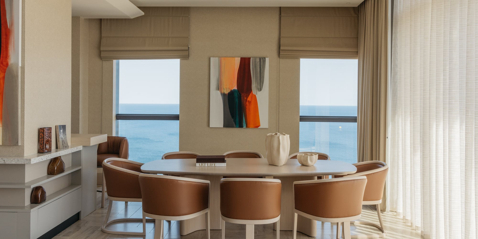 a room with a table and chairs