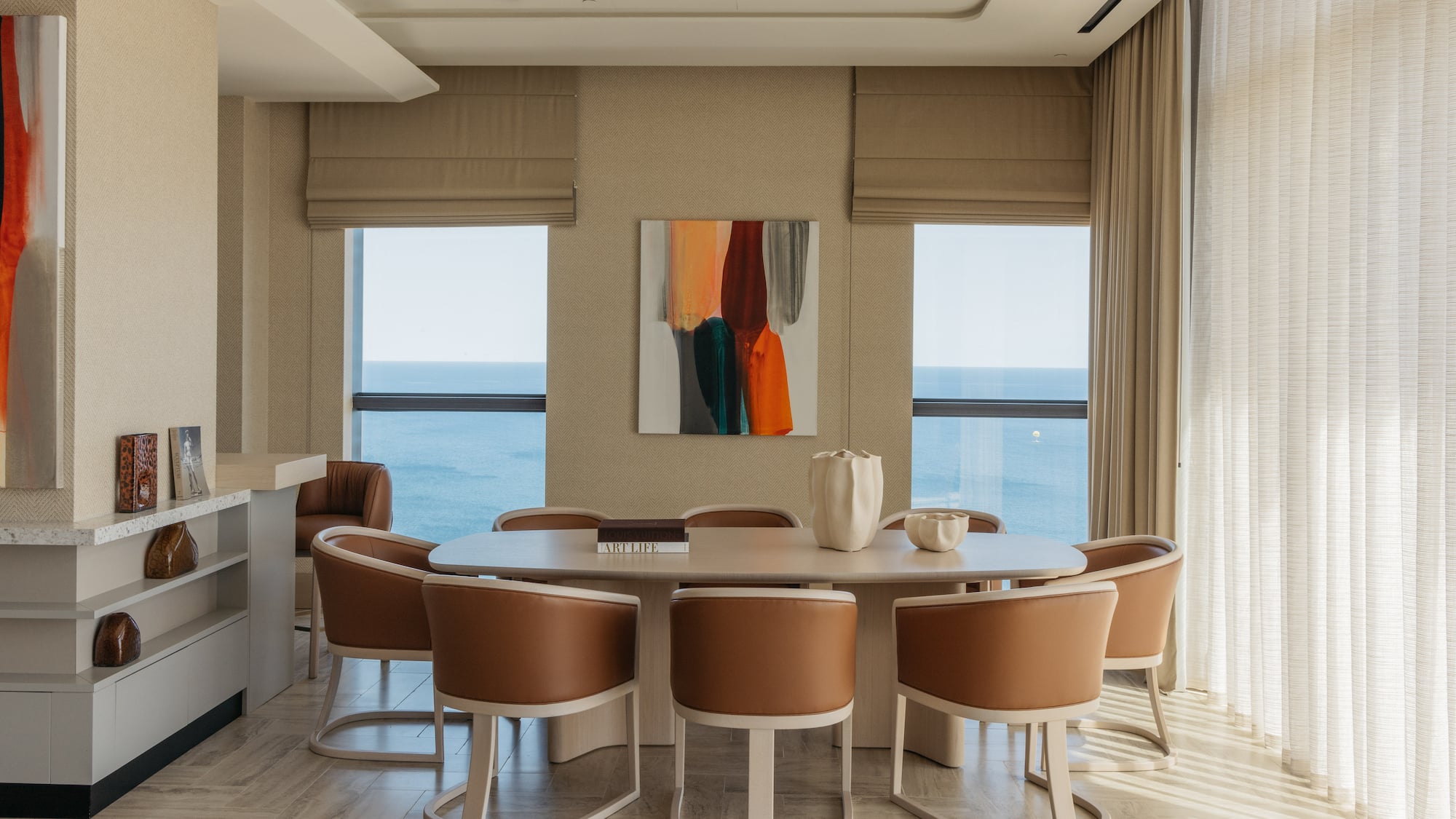 a room with a table and chairs