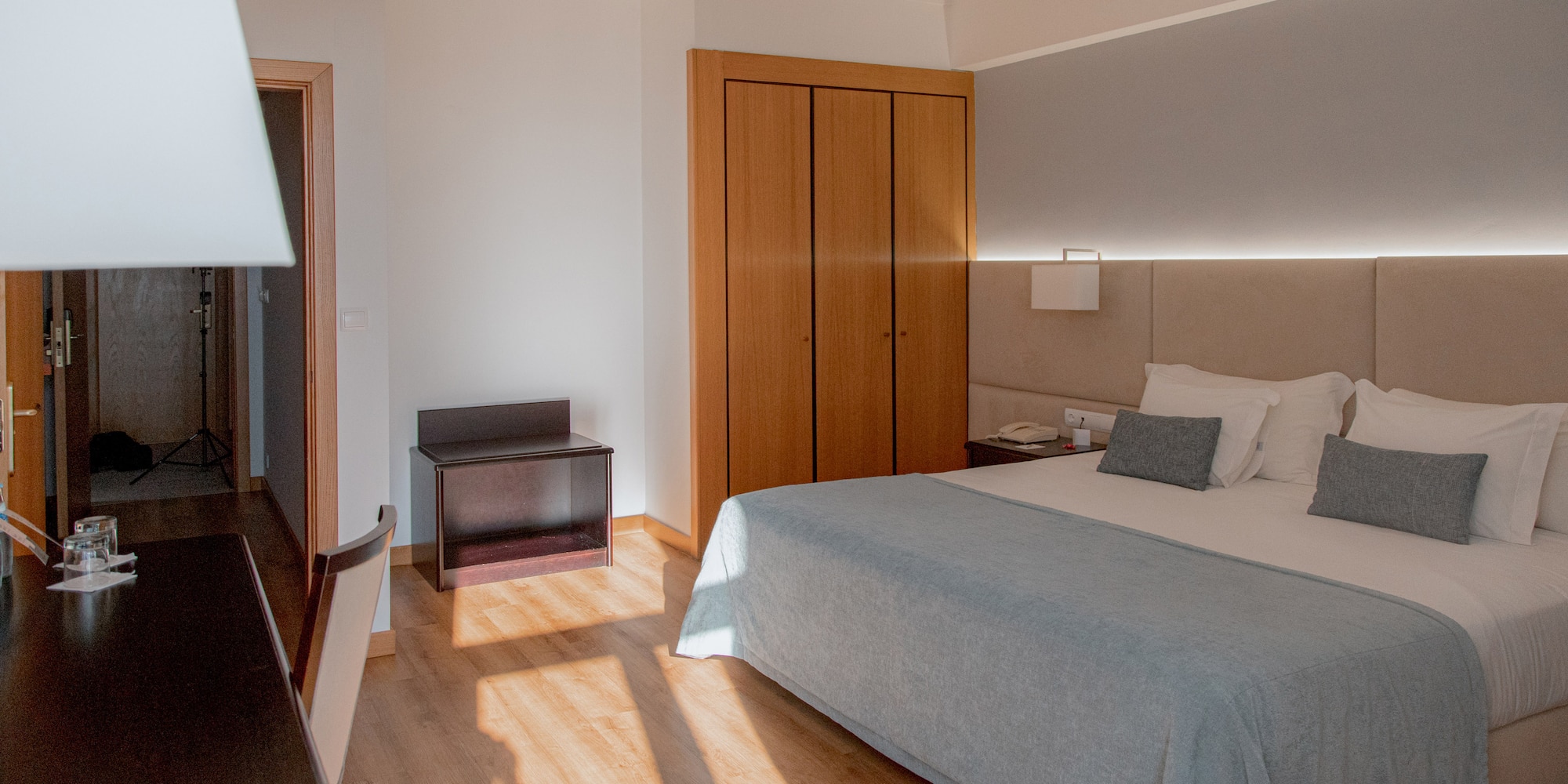 a bedroom with a bed and closets