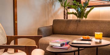 a living room with a couch and a table