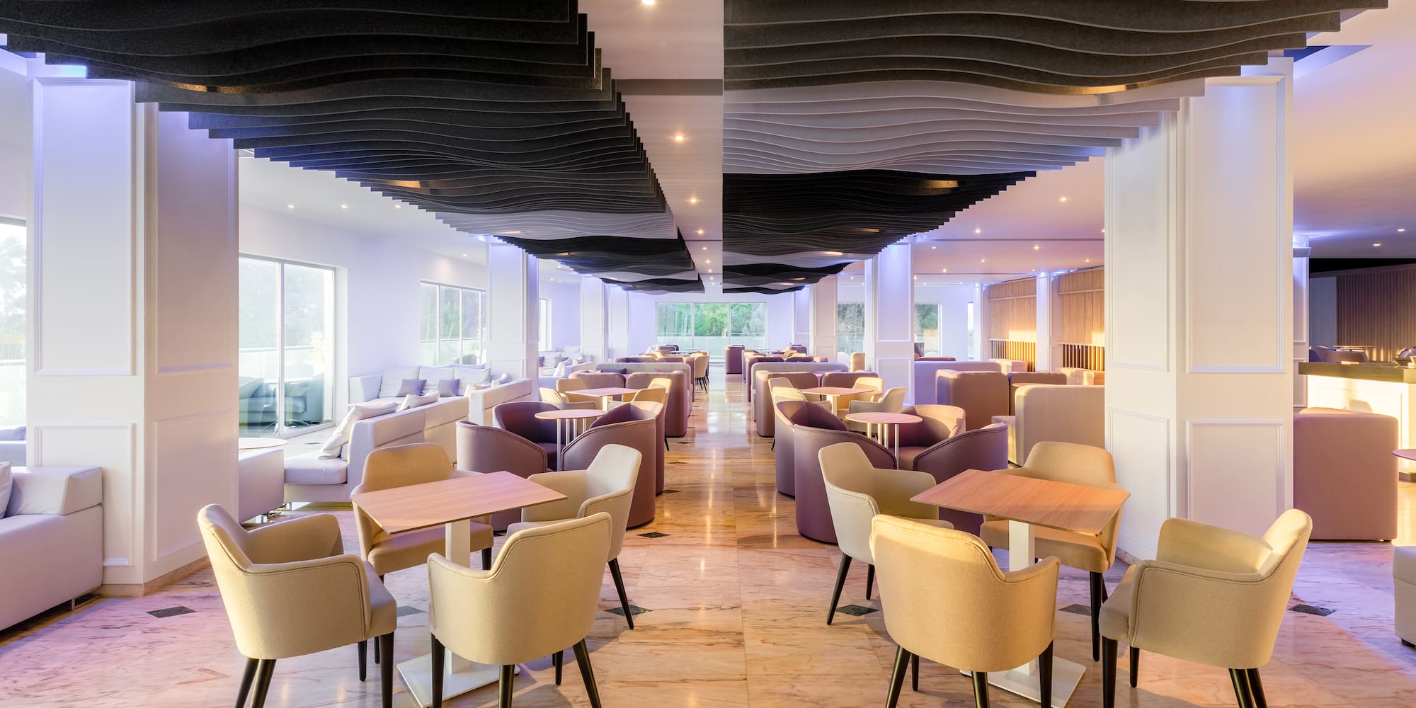 a room with tables and chairs