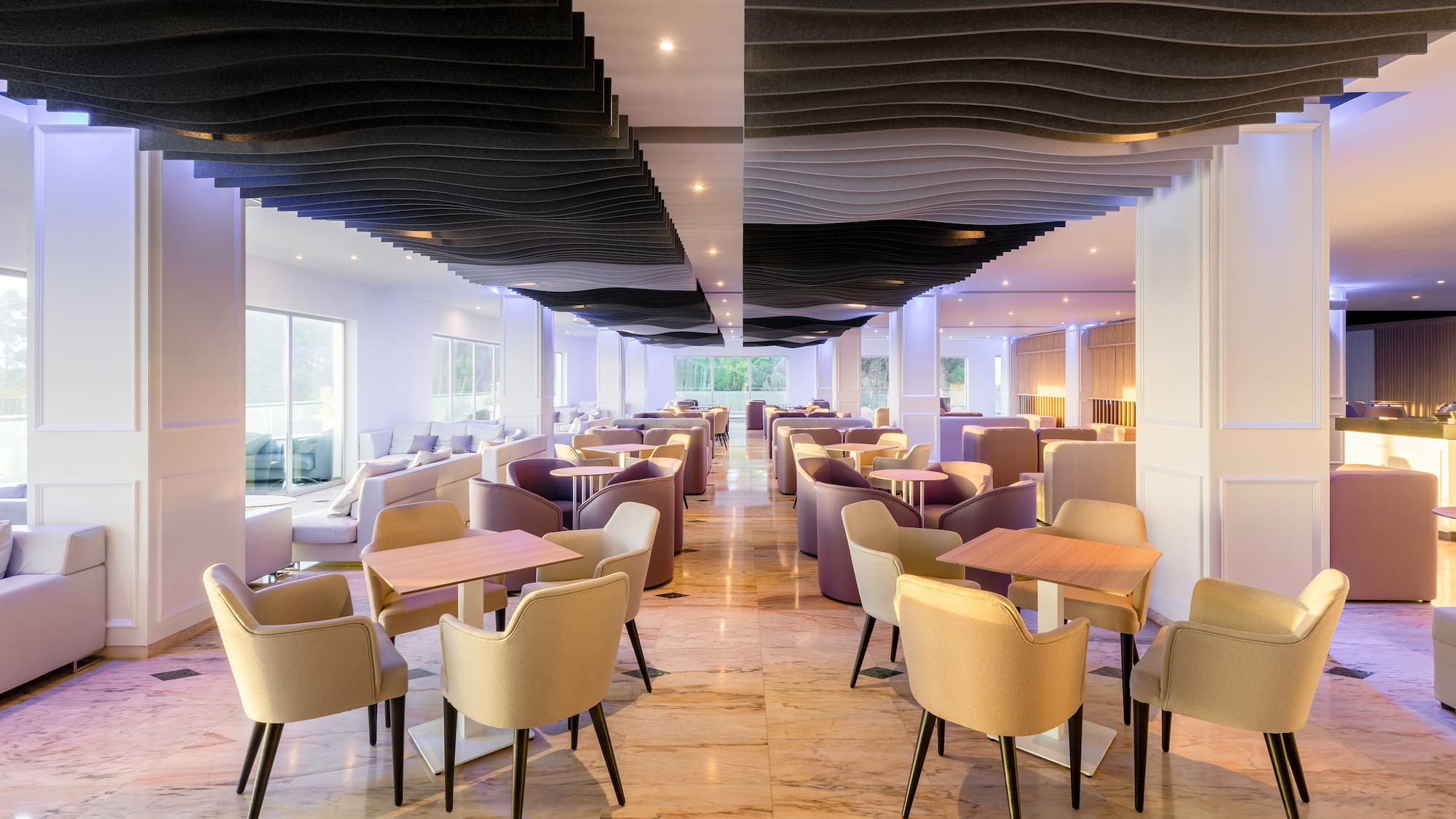 a room with tables and chairs