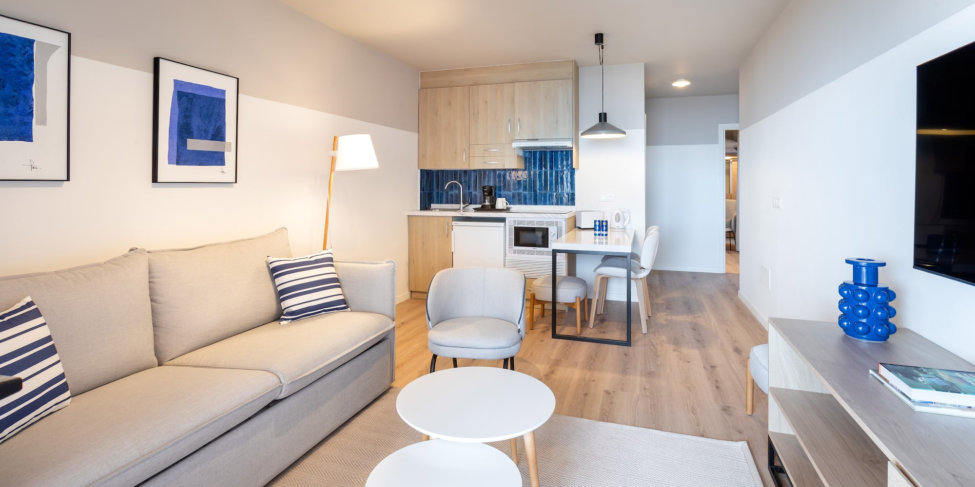 a living room with a couch and a table