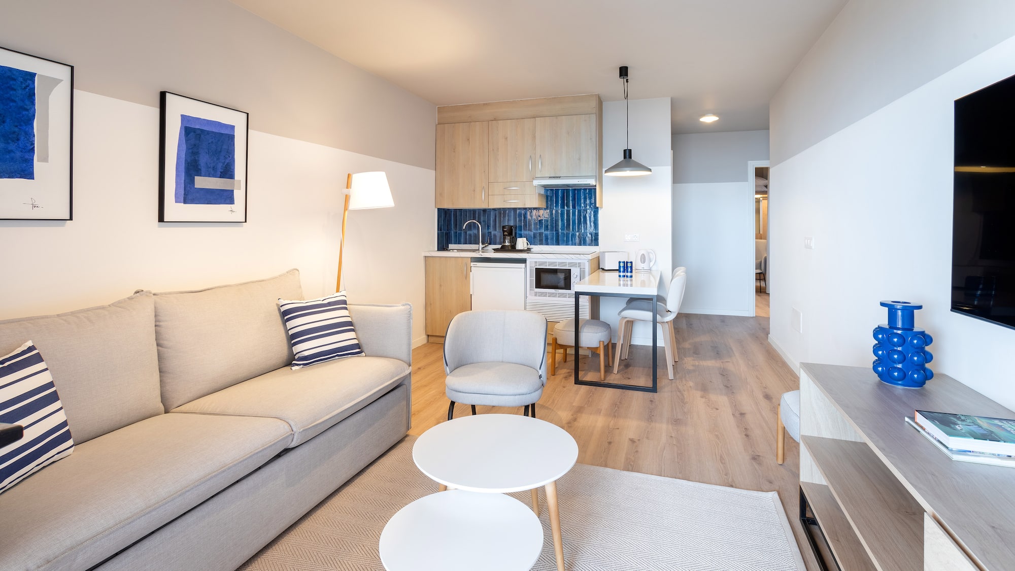 a living room with a couch and a table