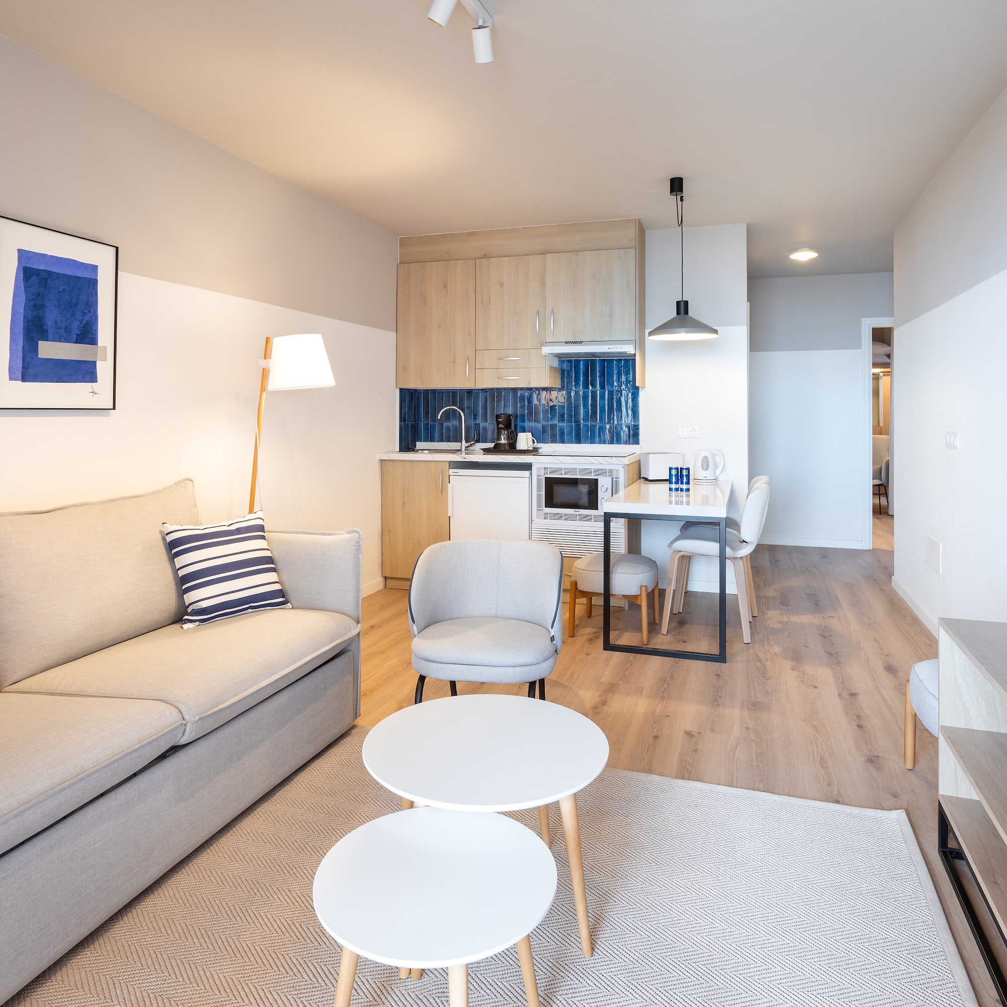 a living room with a couch and a table