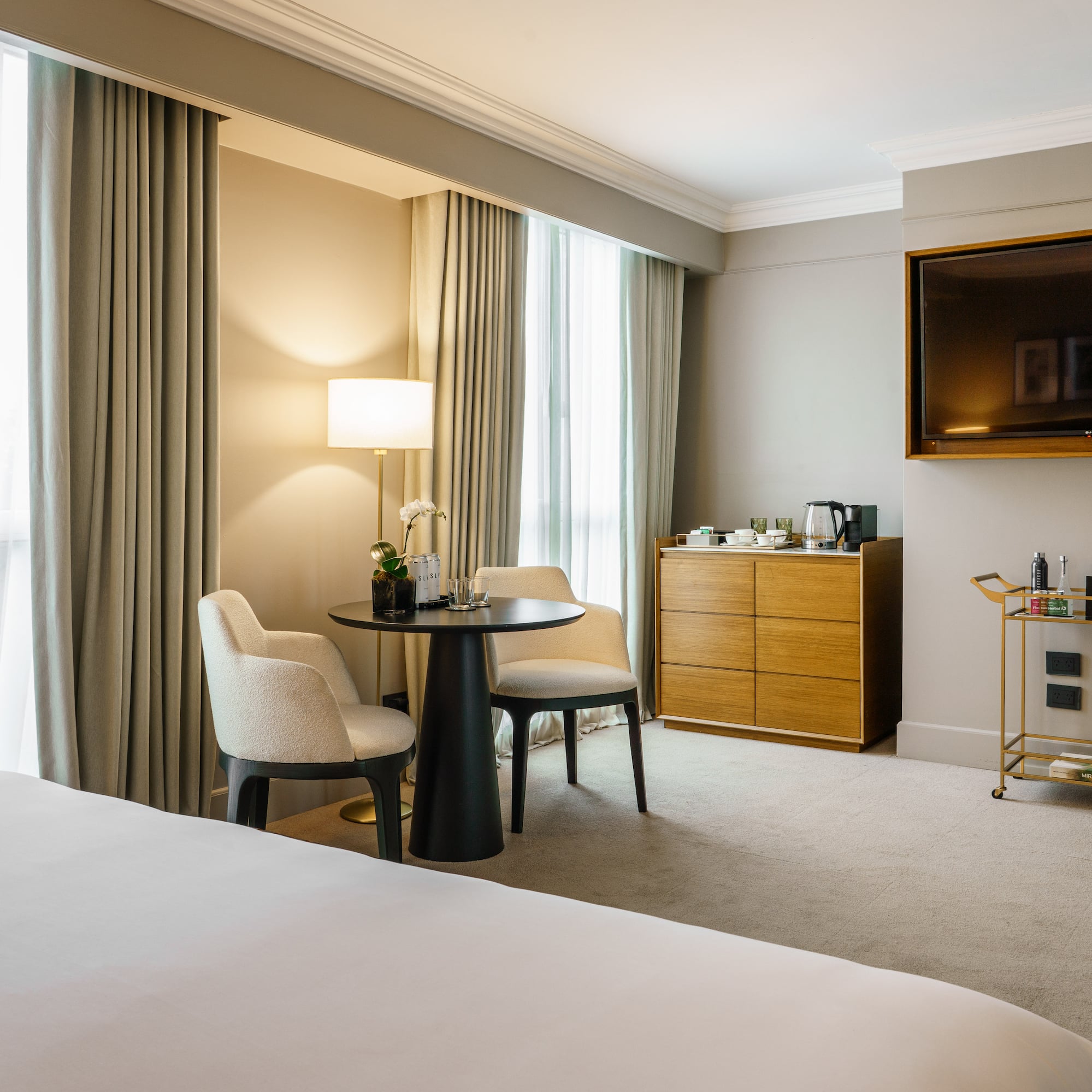 a room with a tv and a table