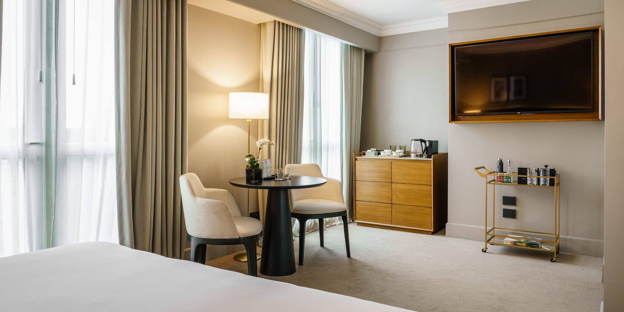 a room with a tv and a table