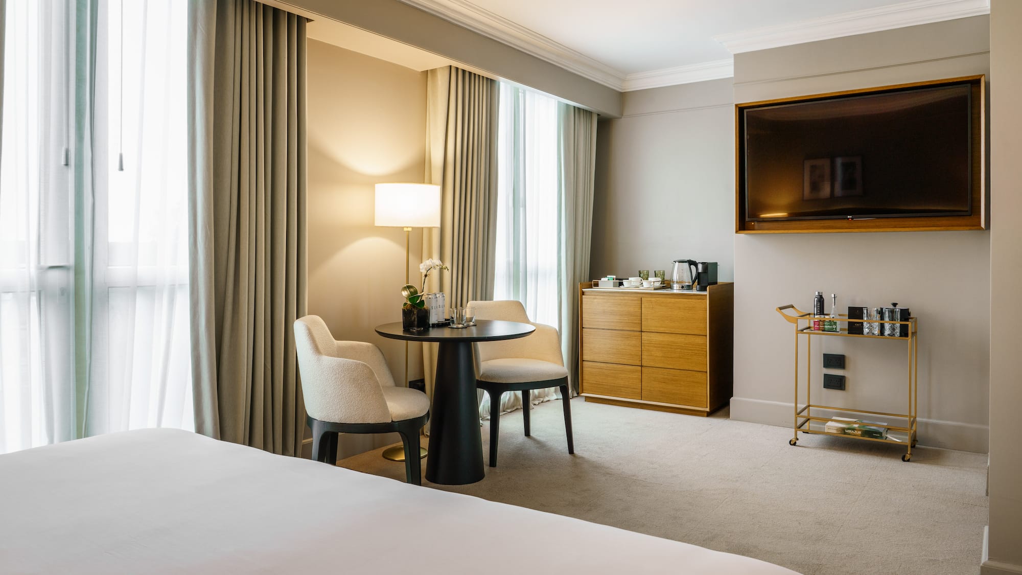 a room with a tv and a table