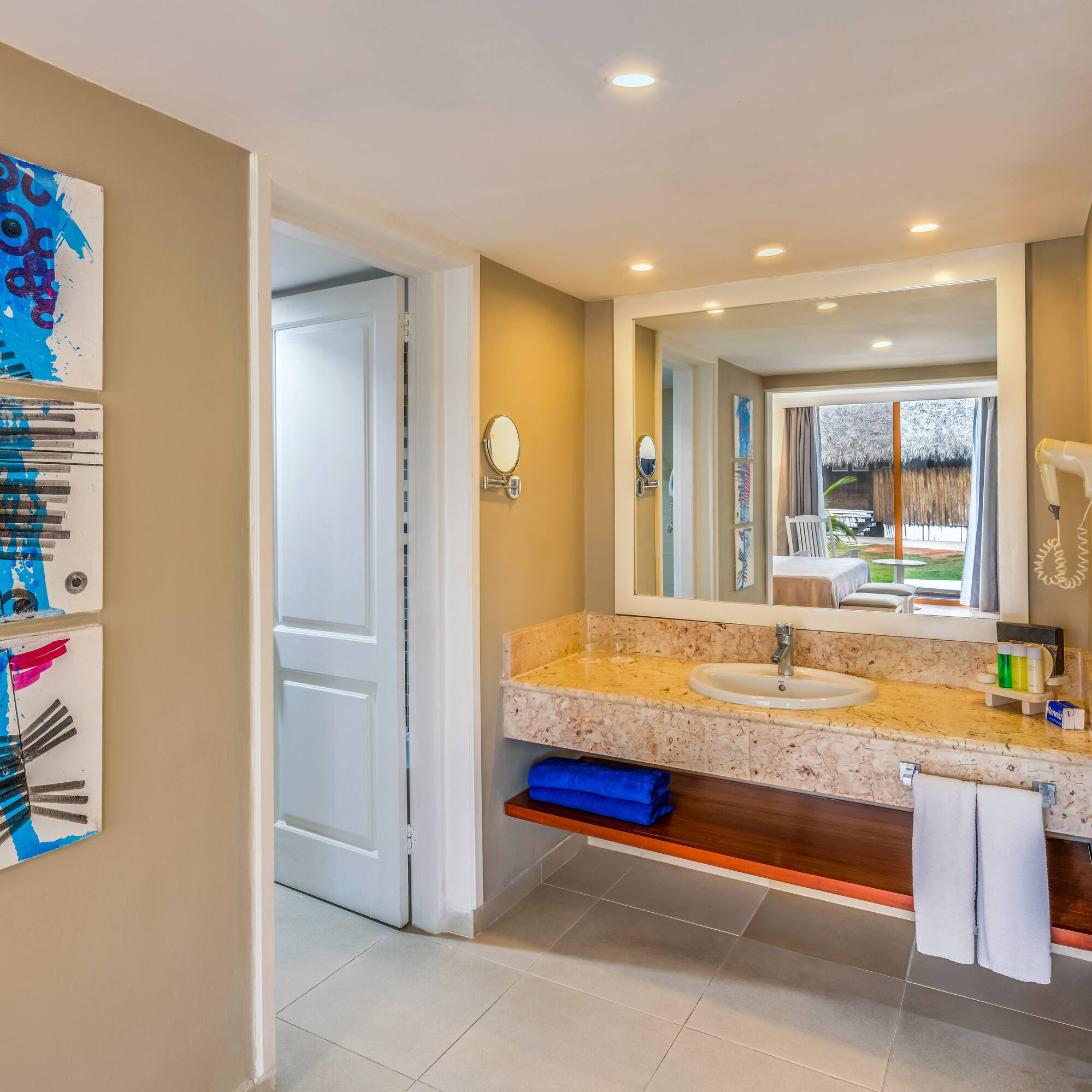 a bathroom with a sink and mirror