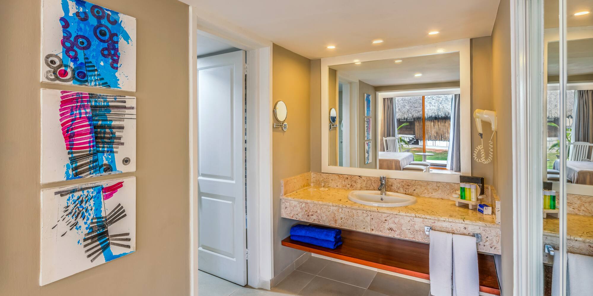 a bathroom with a sink and mirror