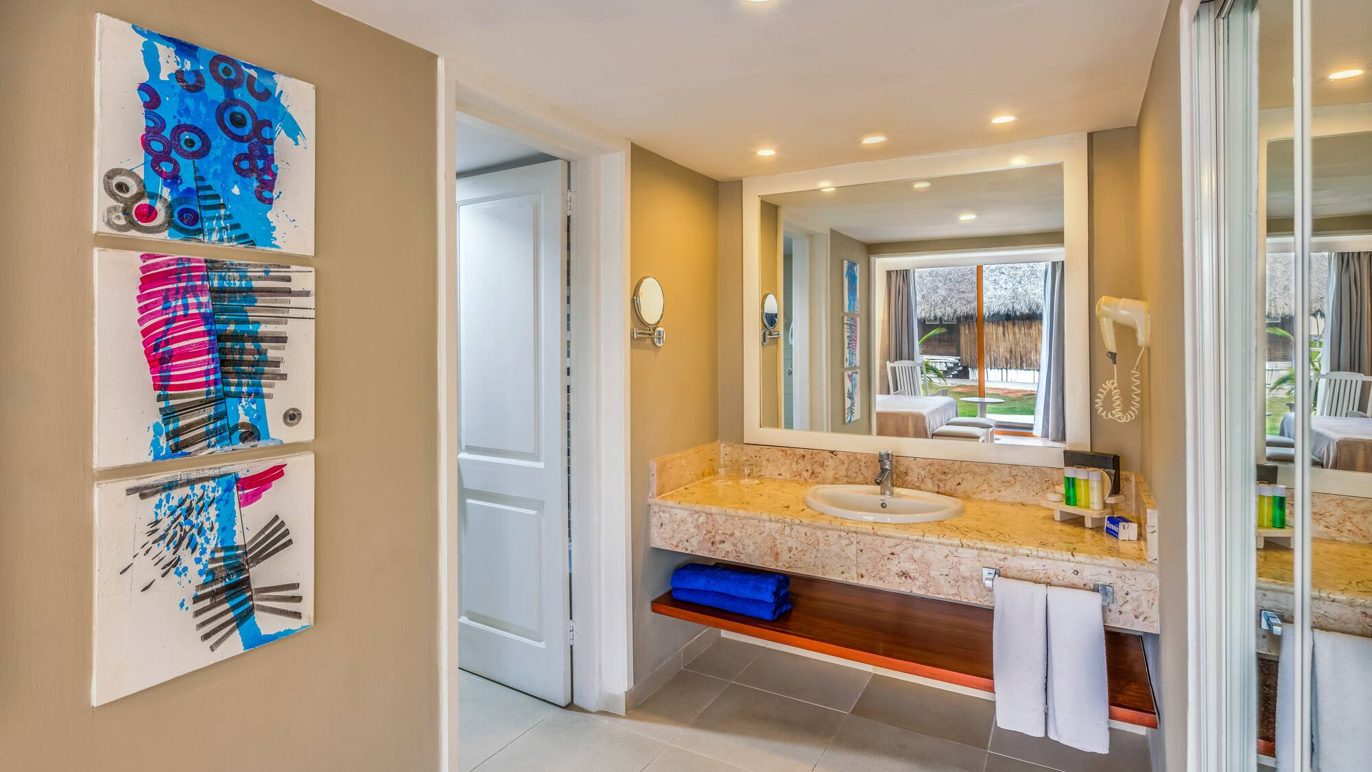 a bathroom with a sink and mirror