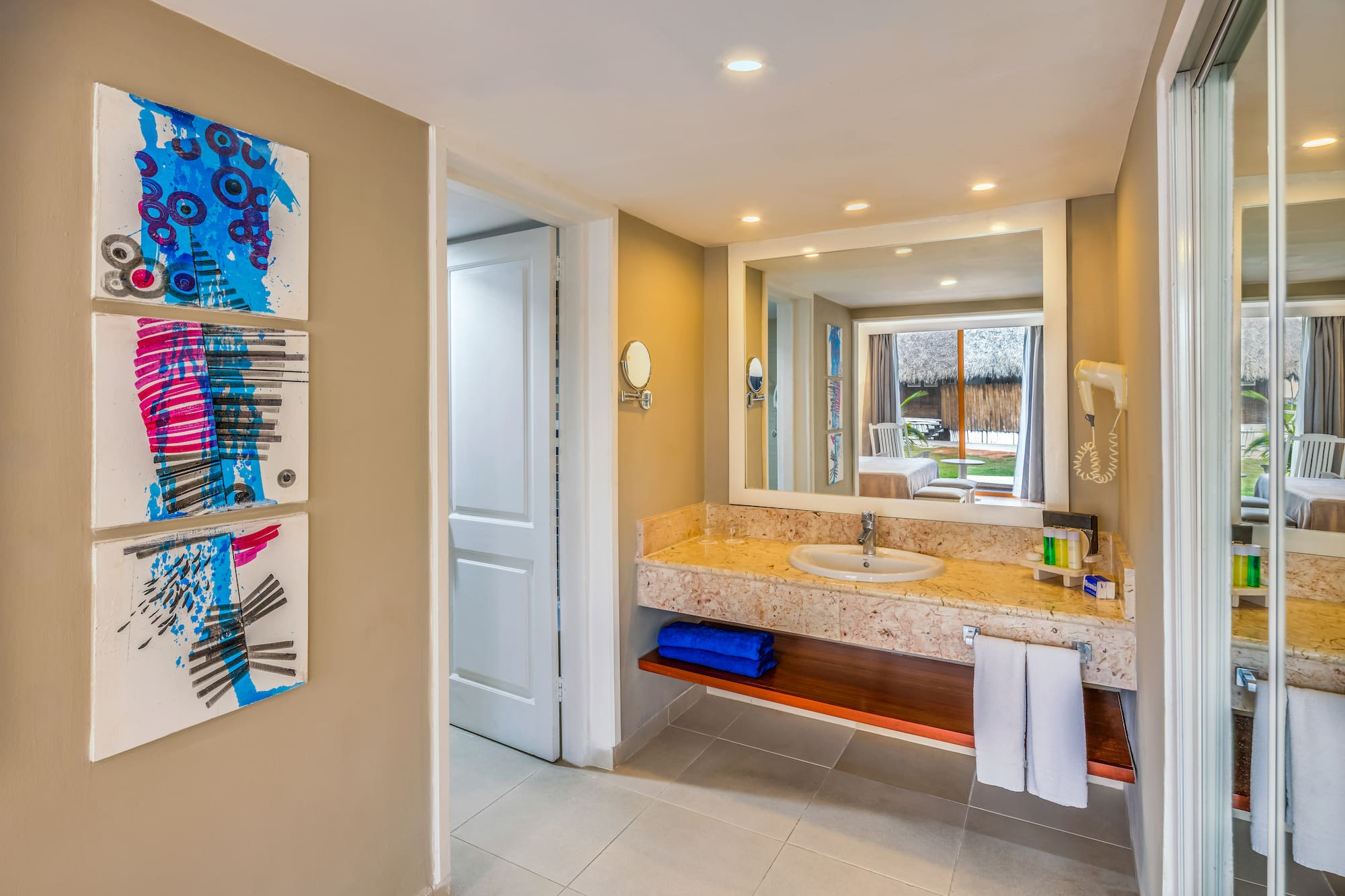 a bathroom with a sink and mirror