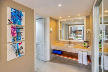 a bathroom with a sink and mirror