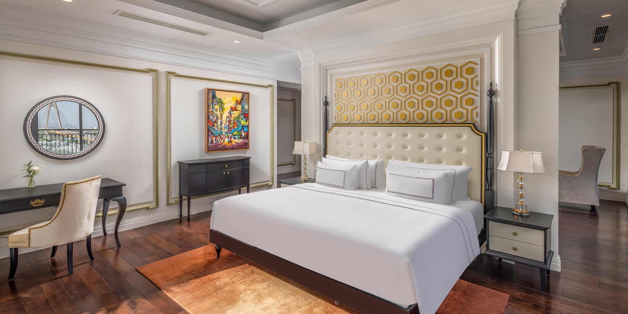 a bedroom with a bed and a table