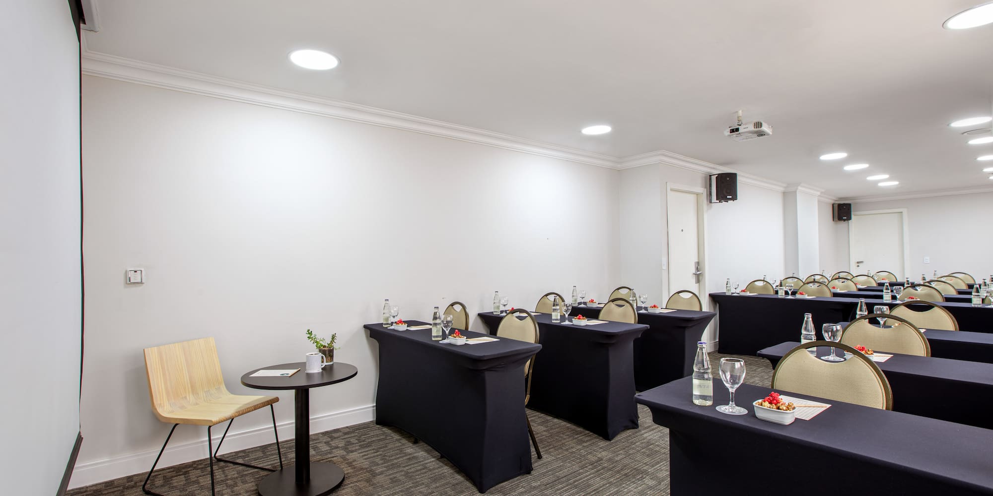 a room with tables and chairs