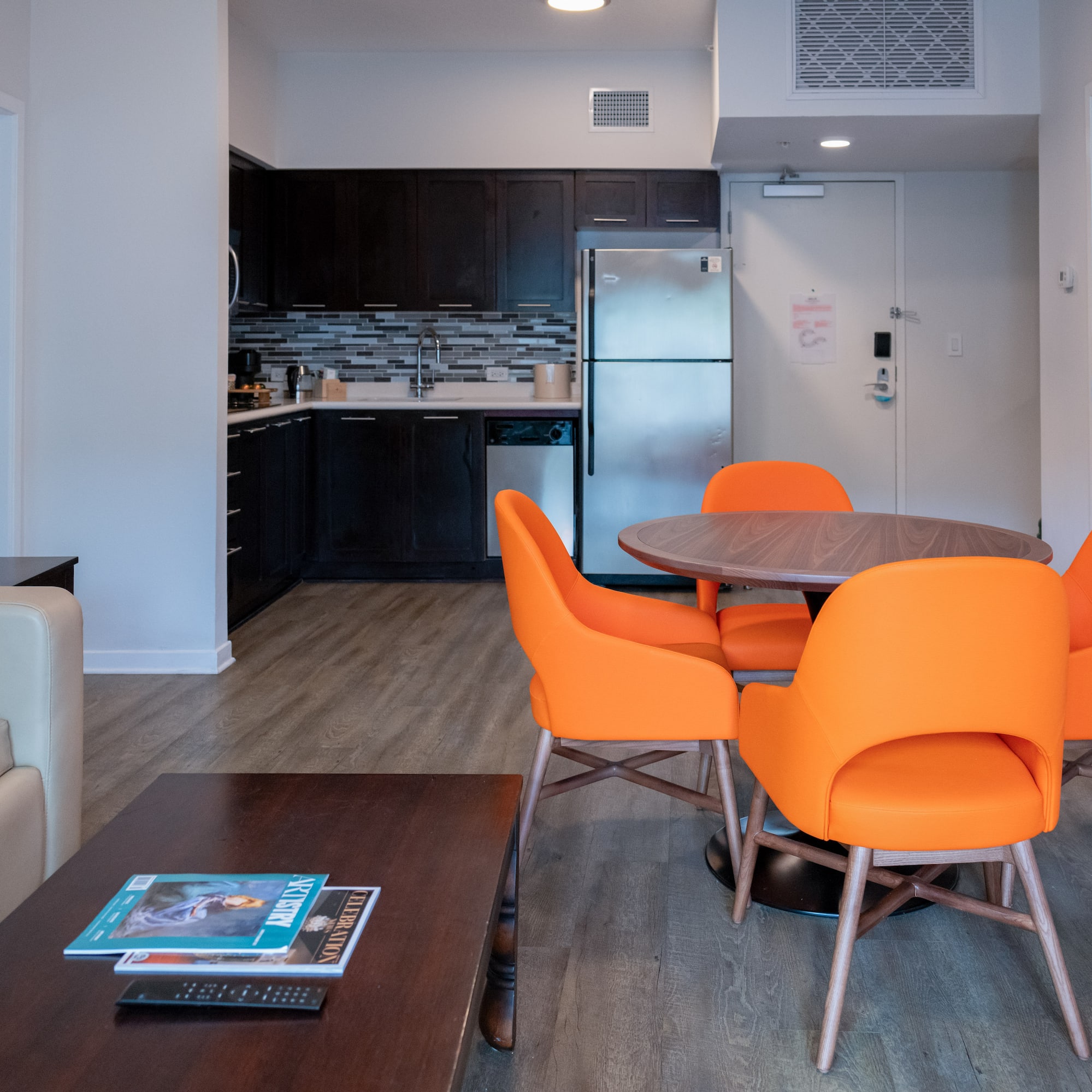 a room with a table and chairs