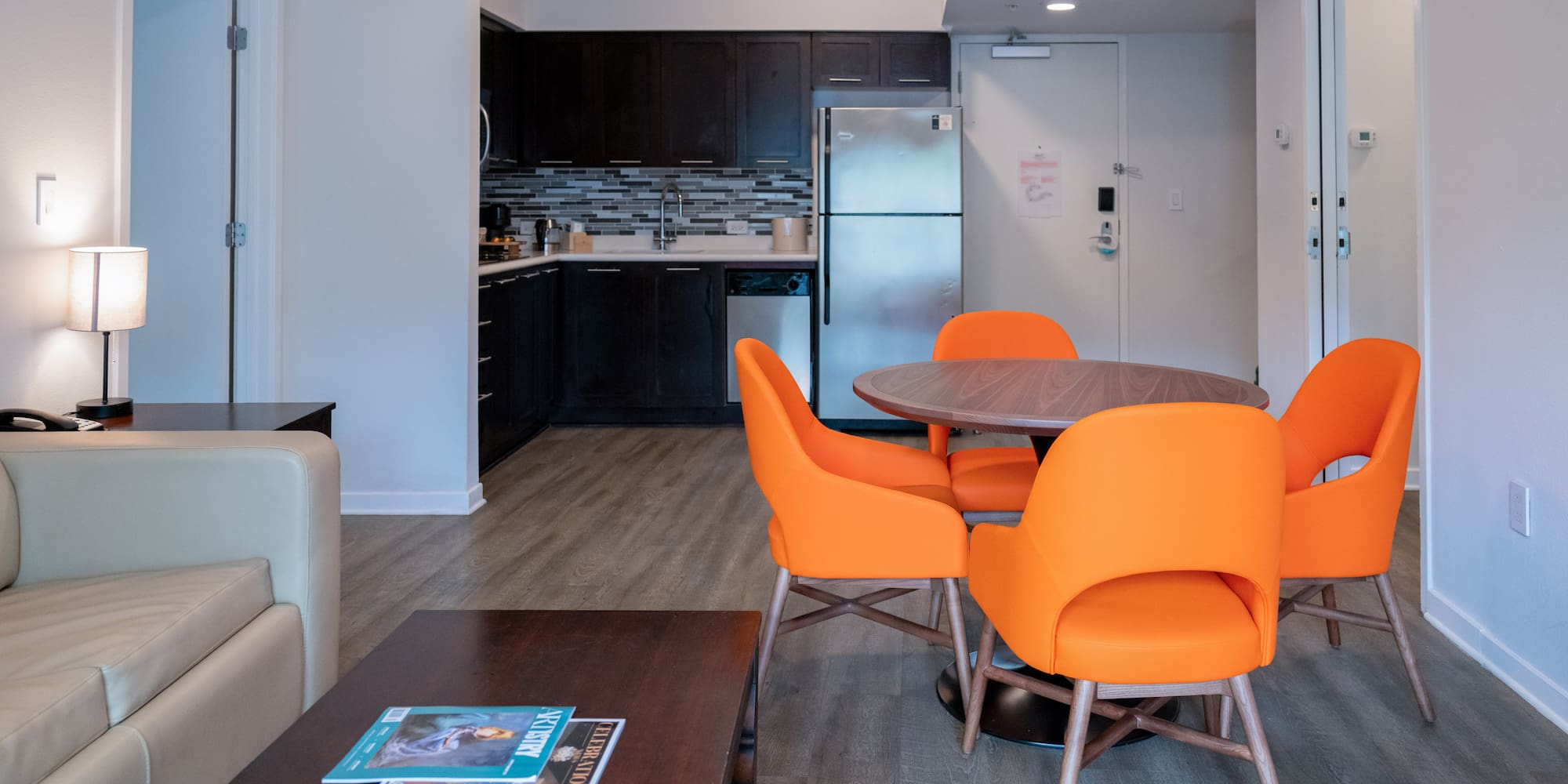 a room with a table and chairs