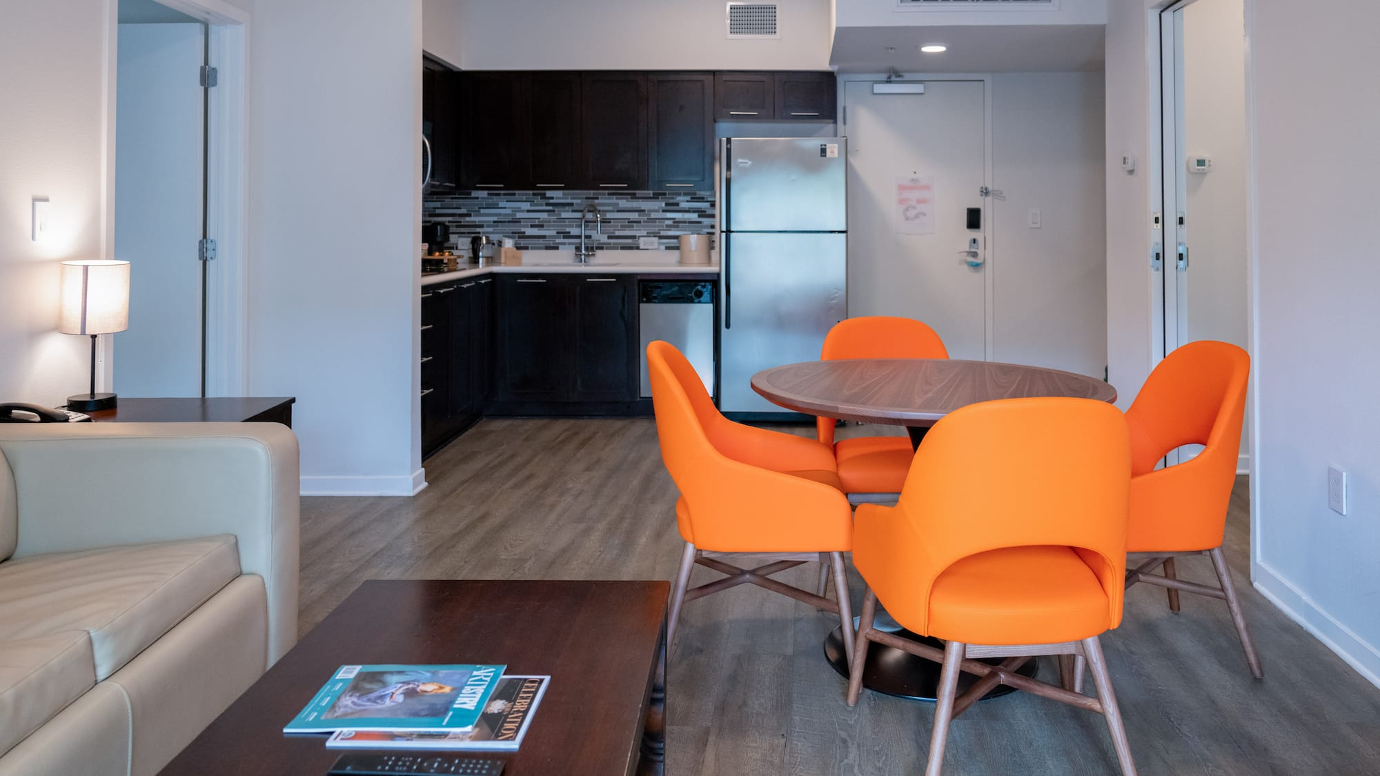 a room with a table and chairs