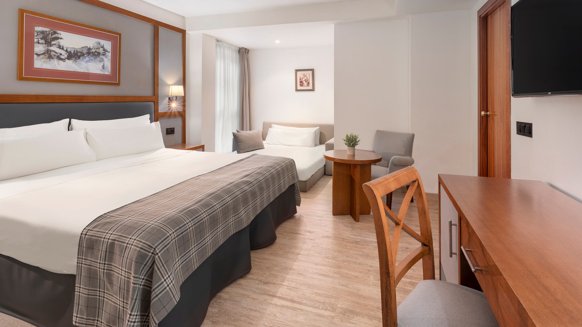 a room with a bed and a table