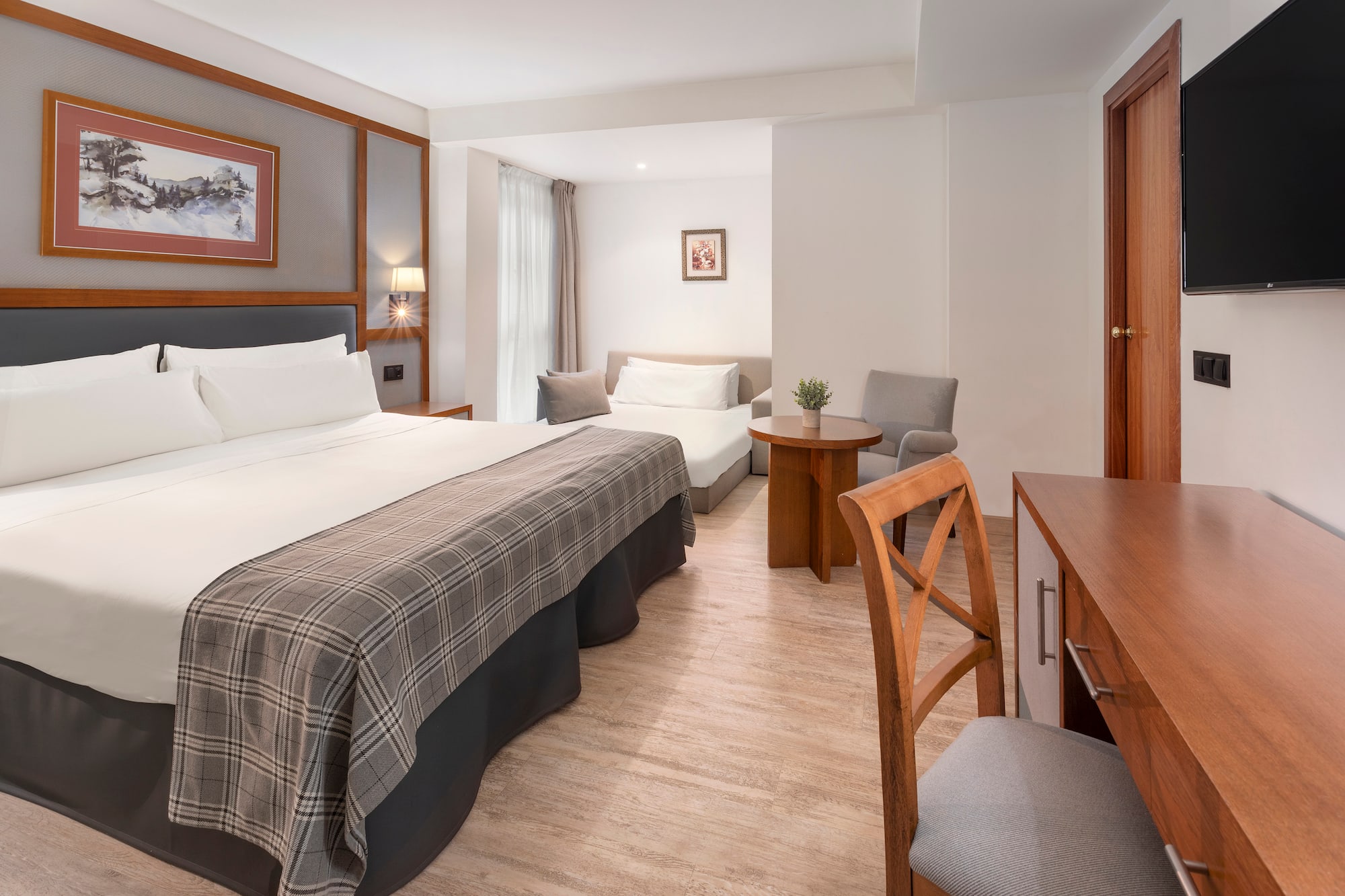 a room with a bed and a table