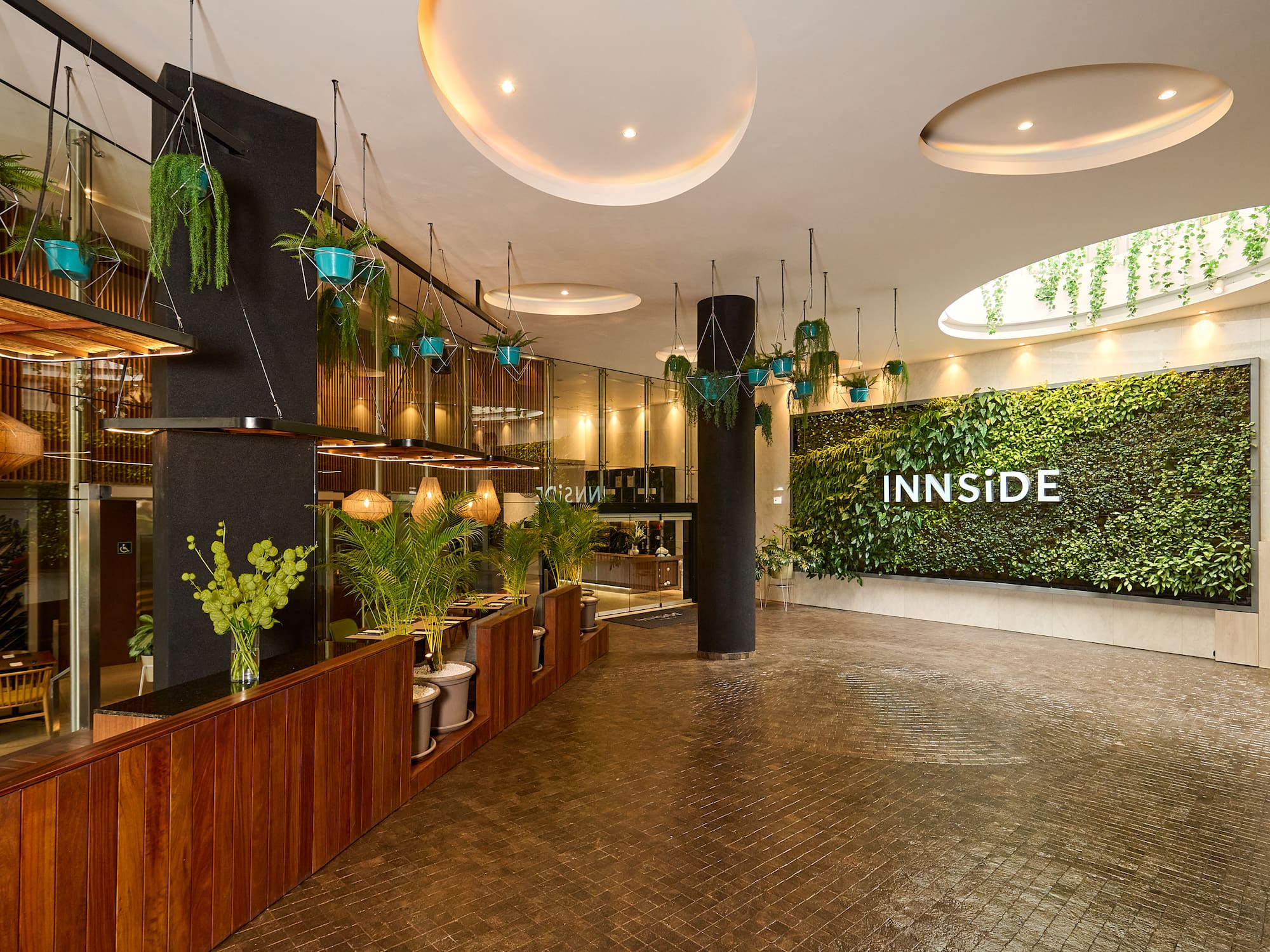 a room with plants and a sign