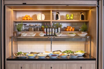 a buffet with food on shelves