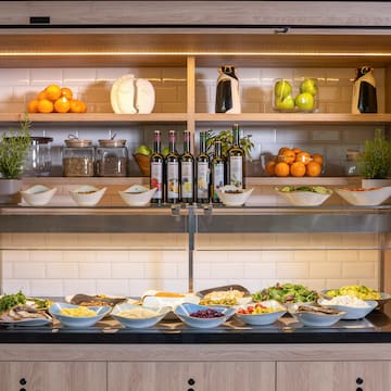 a buffet with food on shelves